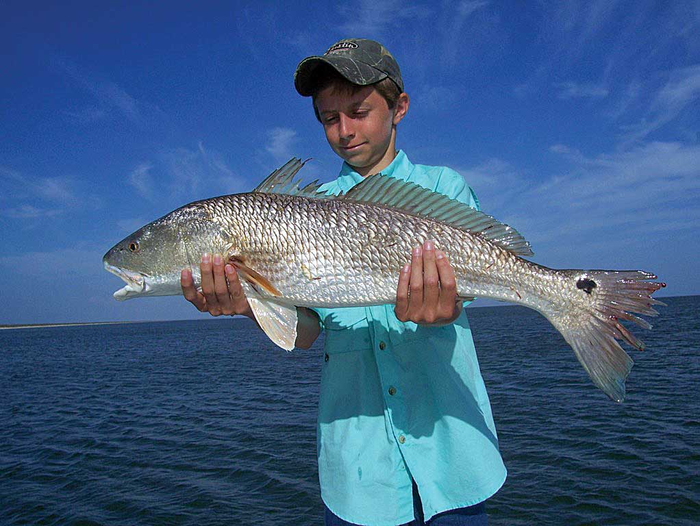 A great redfish catch while inshore fishing.